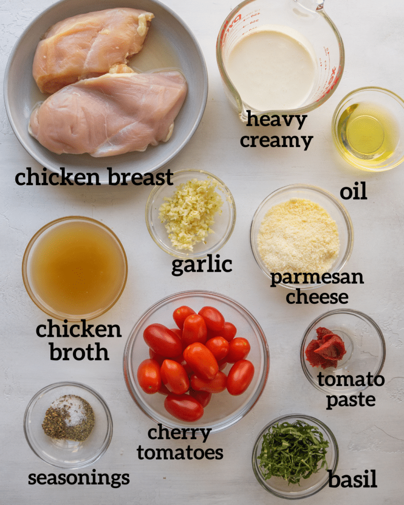 Above view of ingredients for tomato basil chicken recipe