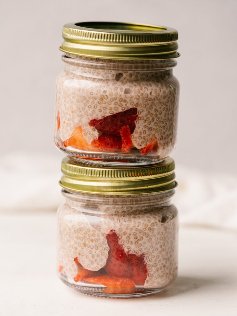 Side view of jars of Strawberry Whole30 Chia pudding