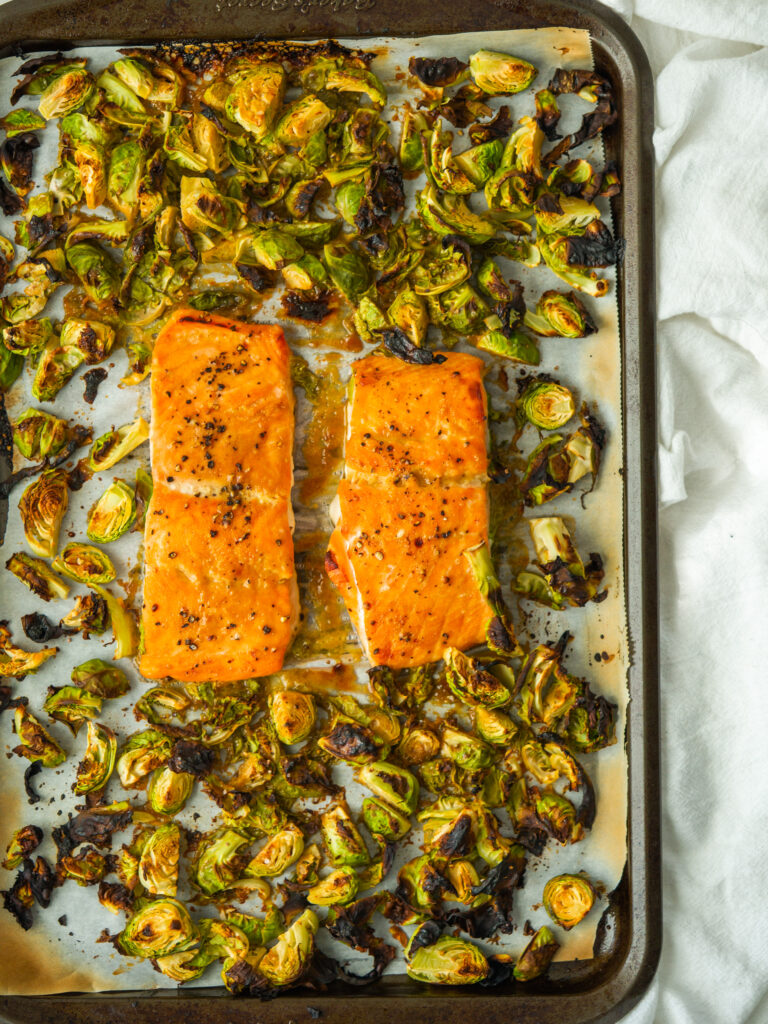 Dijon salmon recipe on a sheet pan with crispy brussels sprouts