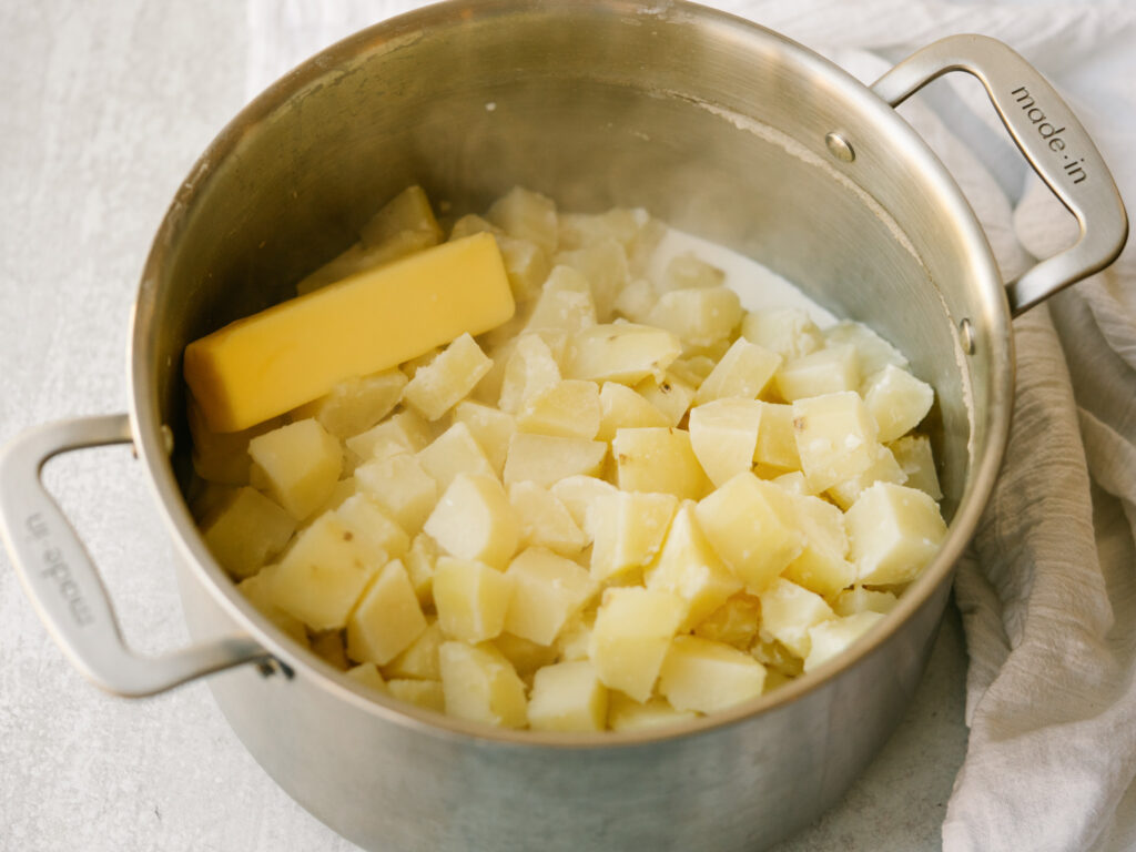 For tender boiled russet potatoes in a stock pot with butter and milk