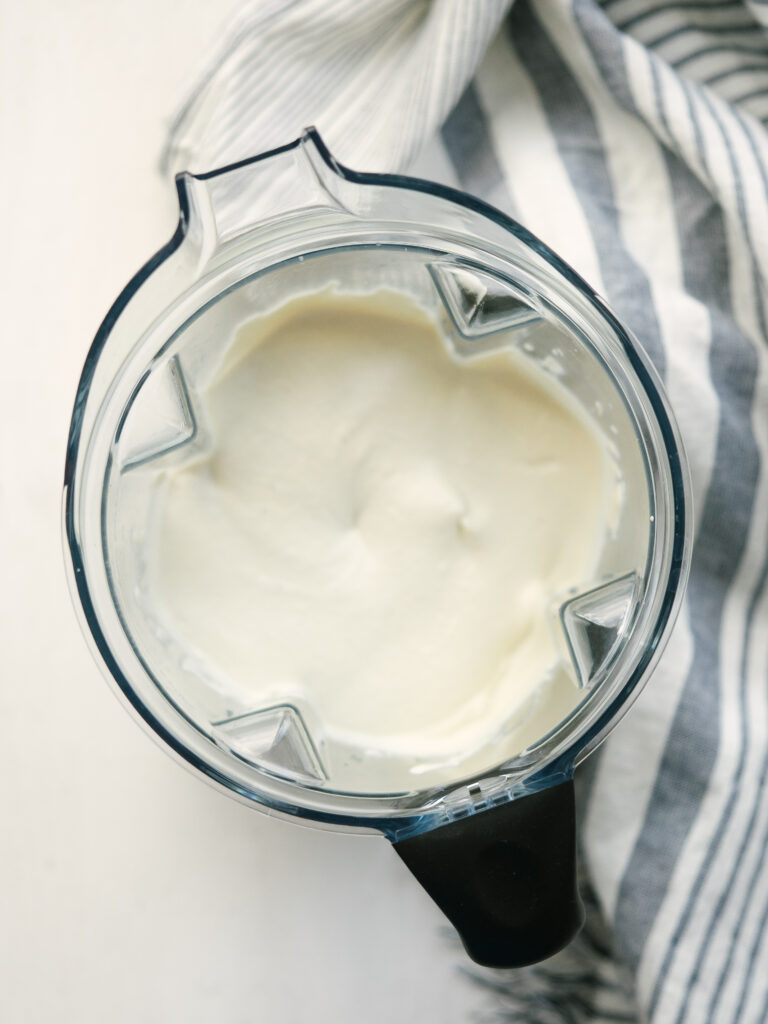 Above view of cashew sour cream in a blender