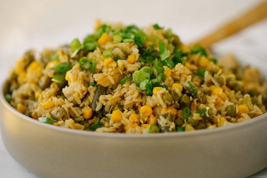 a side view of pantry fried rice in a gray bowl