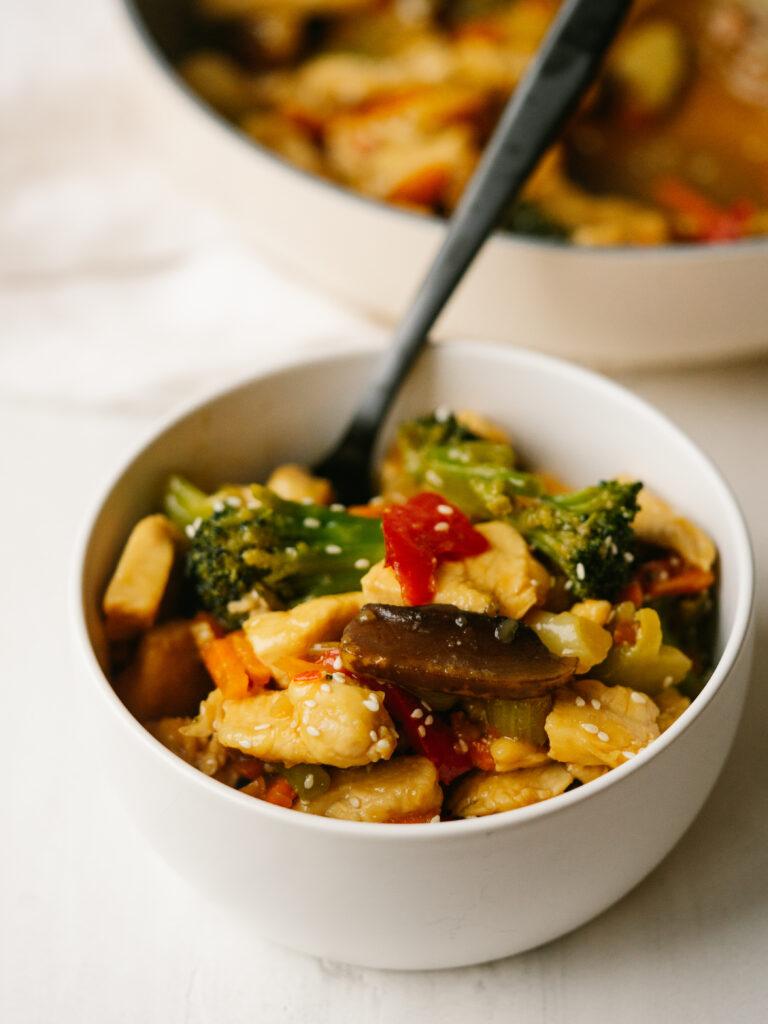 bowl of stir fry chicken and vegetables