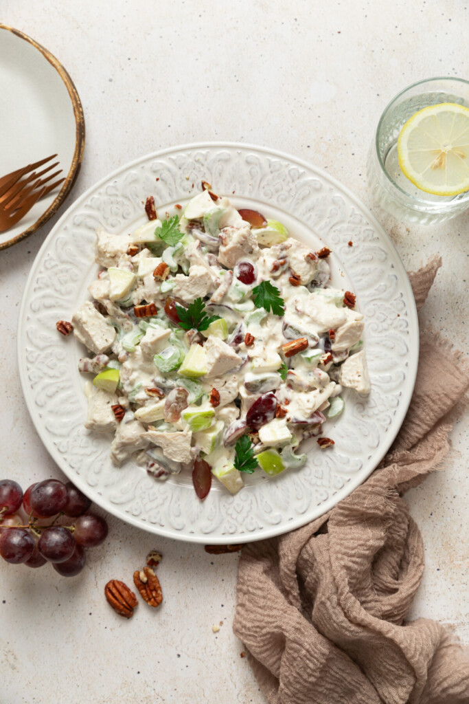 an above view image of chicken waldorf salad on a white plate