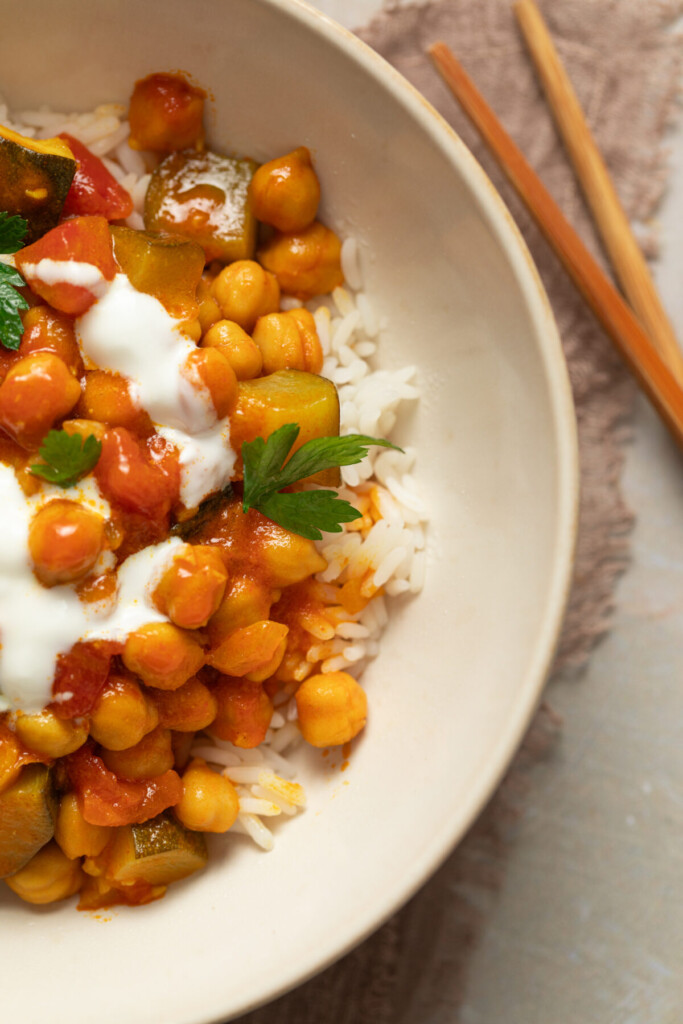 close up above view of creamy chickpea stew in a serving bowl