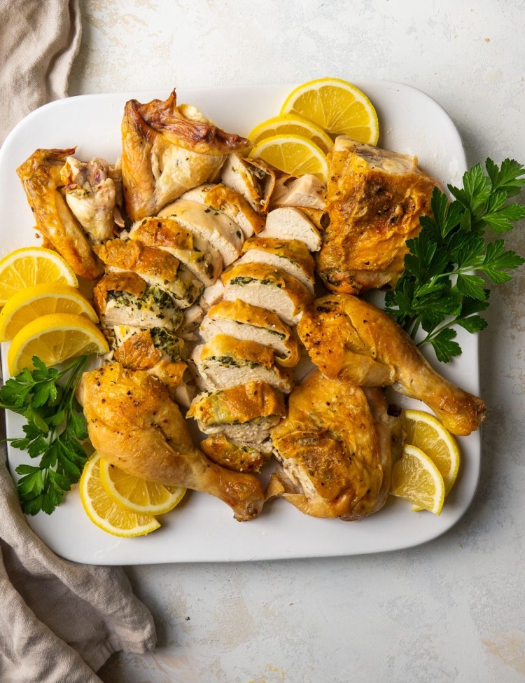 Above view of lemon herb chicken on a serving platter