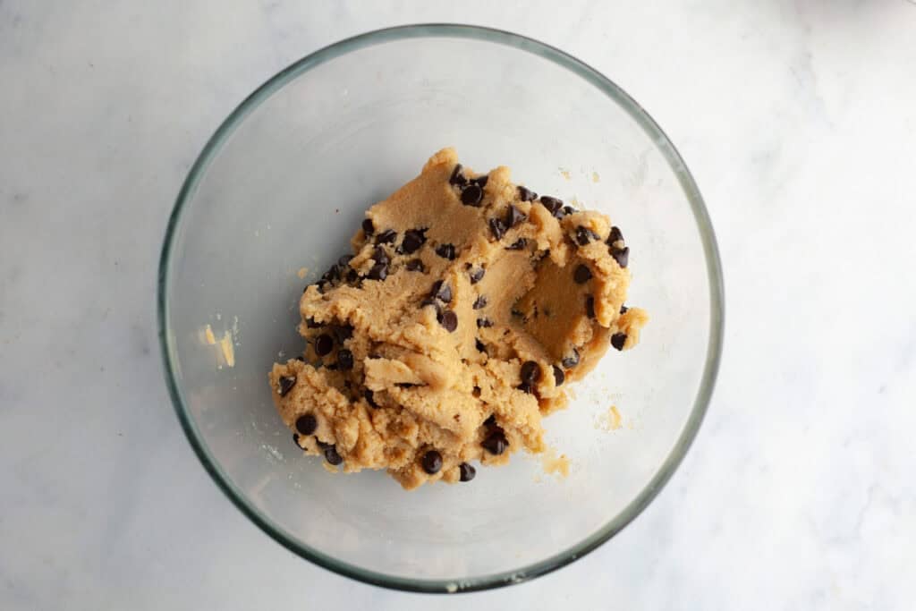 grain free chewy chocolate chip cookie dough in a glass bowl