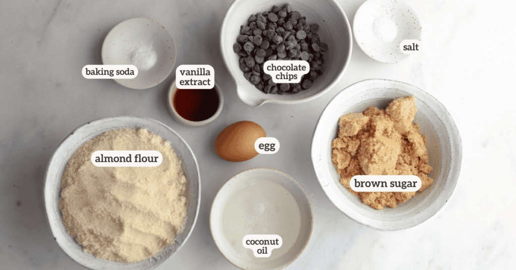 the ingredients for grain free chewy chocolate chip cookies in small bowls with labels on them