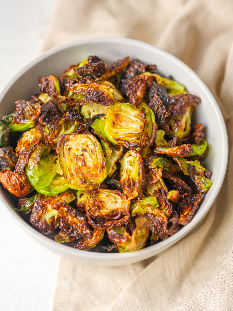 Close up above view of brussels sprouts air fryer in a serving bowl