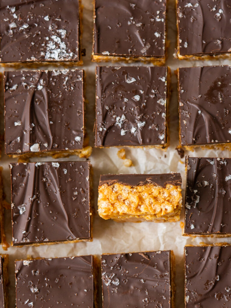 Above view of peanut butter chocolate rice krispie bars cut into squares