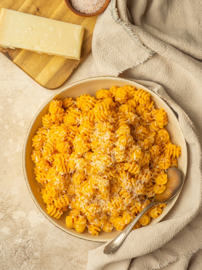 Above view of butternut squash pasta in a serving bowl