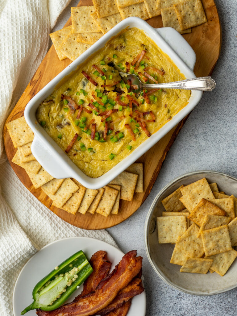 Above view of dairy free jalapeno popper dip served with crackers