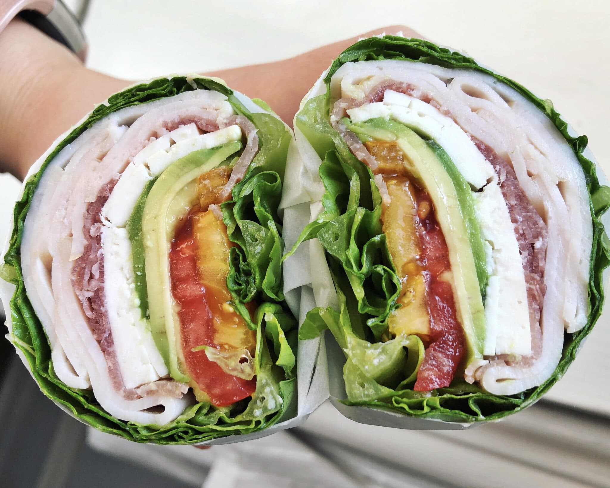 Side view of a low carb lettuce wrap sandwich