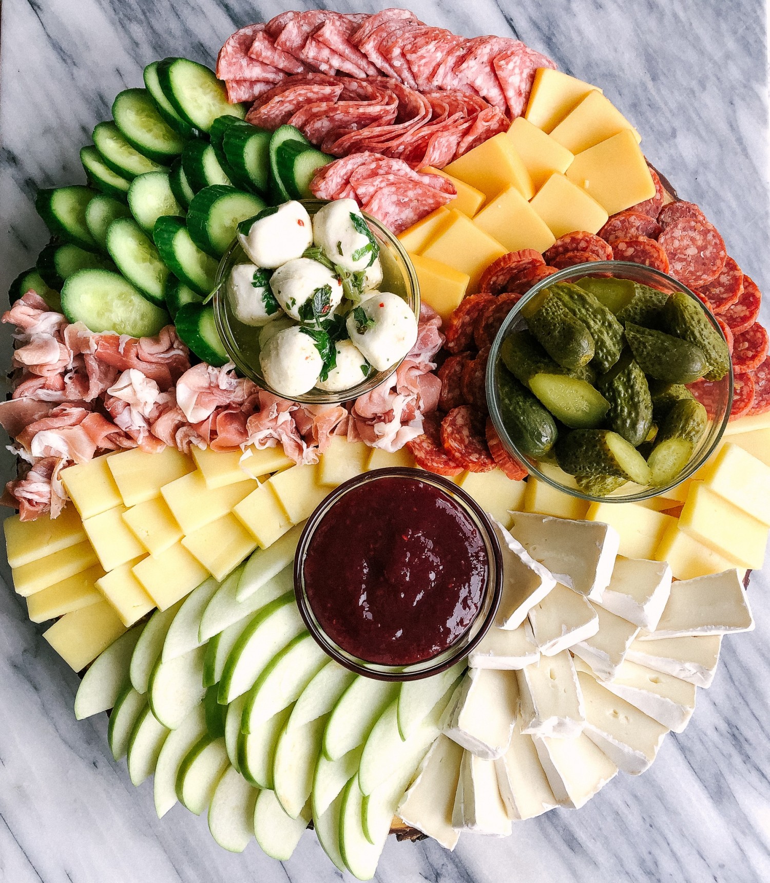 Above view of a colorful charcuterie board for a party