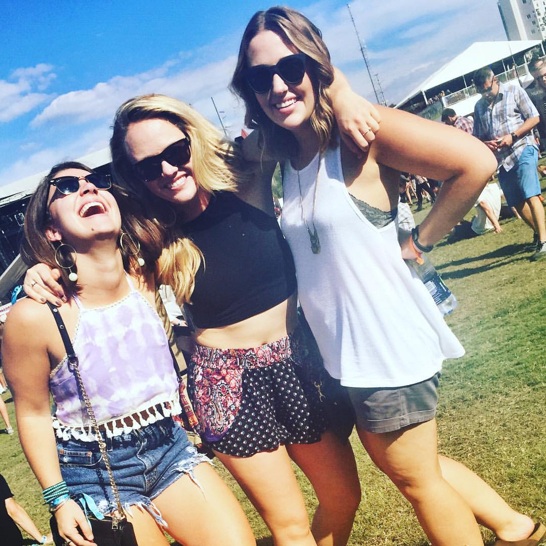 Photo of the writer at a music festival with friends in Atlanta