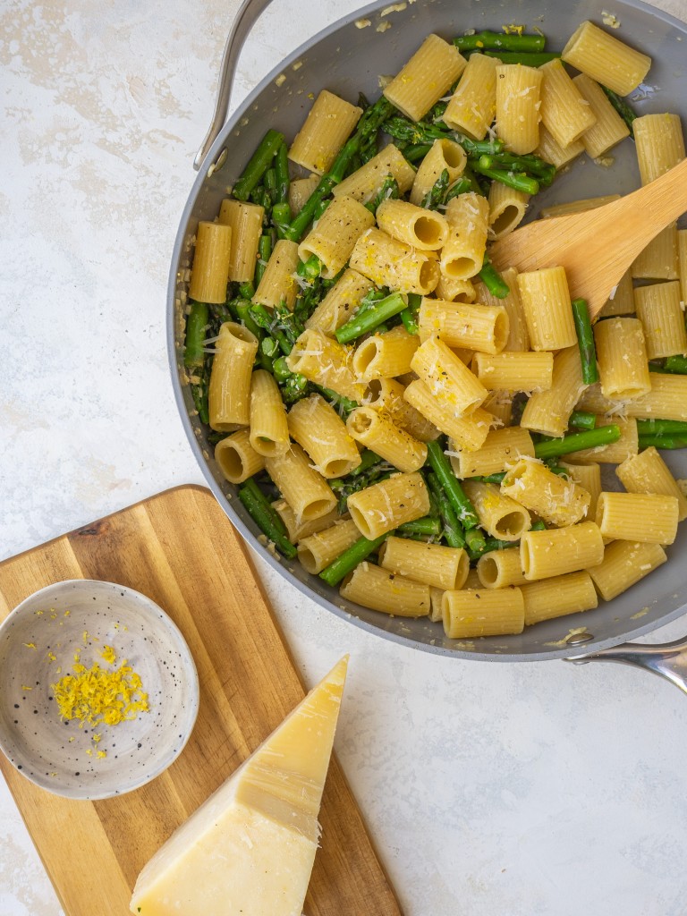 Above view of asparagus pasta recipe with a lemon garlic butter sauce in a saute pan