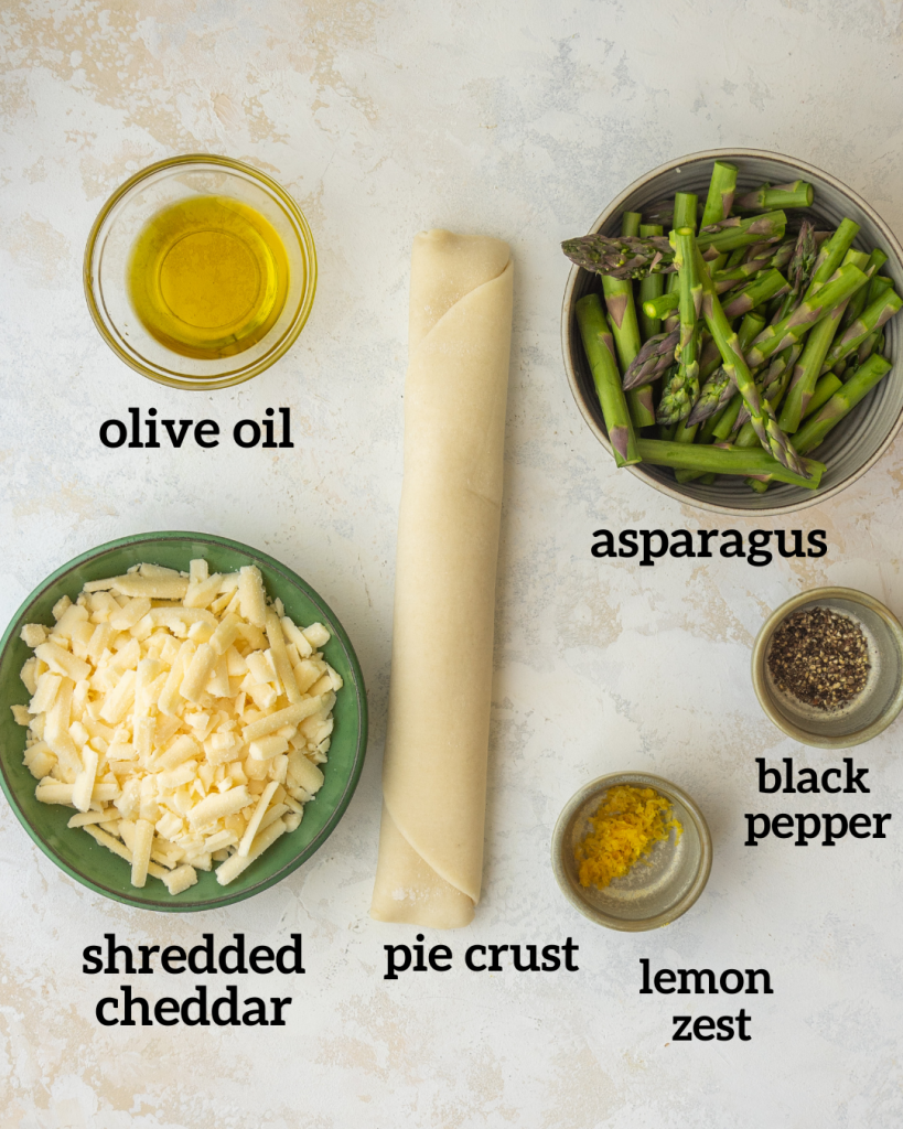 Above view of ingredients for an asparagus and cheddar galette recipe