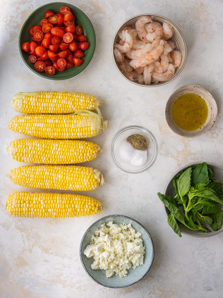 Above view of ingredients for corn tomato salad