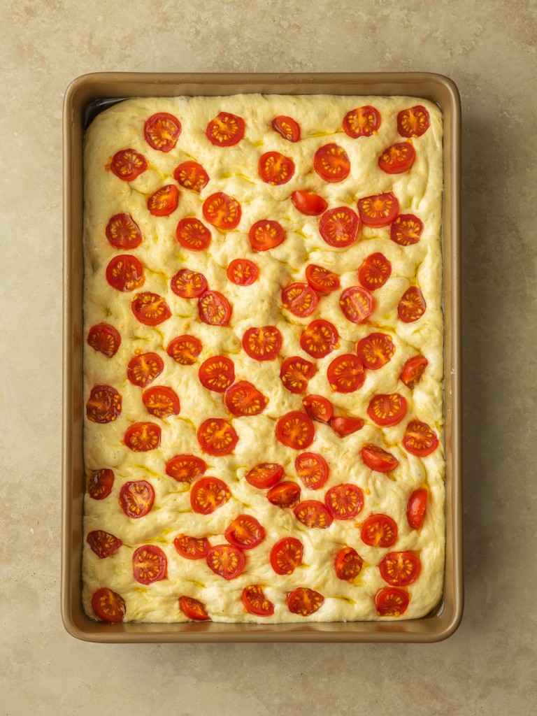 Above view of tomato focaccia before baking