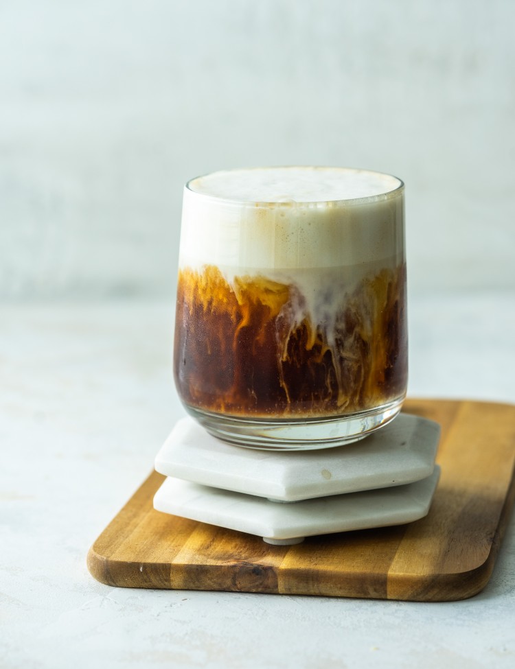 Side view of an iced brown sugar oat milk shaken espresso