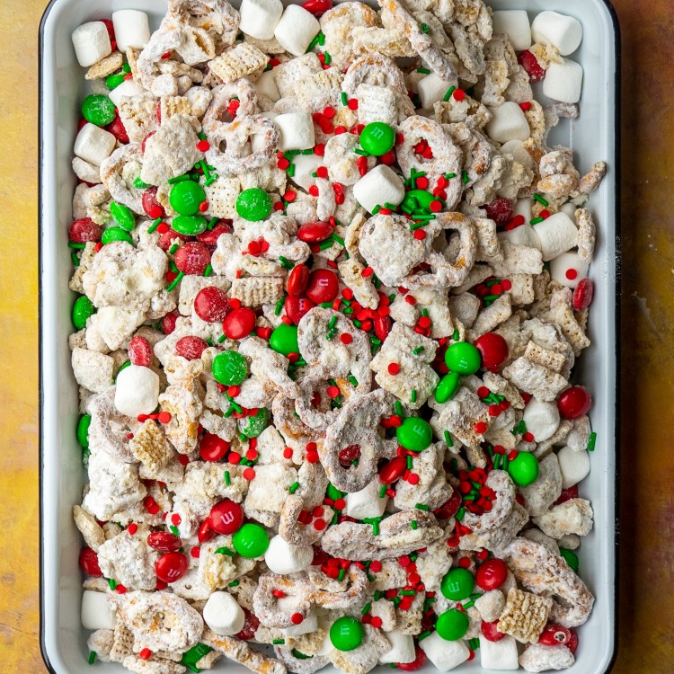 Above view of christmas chex mix on a serving tray