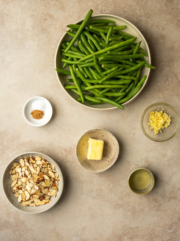 Above view of ingredients for green beans with almonds recipe