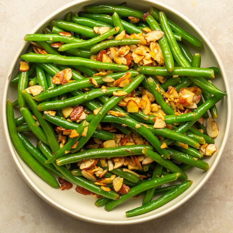 Above view of green bean almondine recipe in a serving bowl