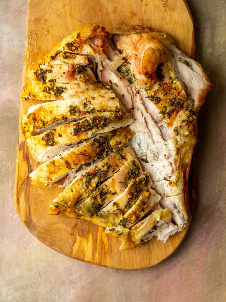 Above view of sliced roasted turkey breast
