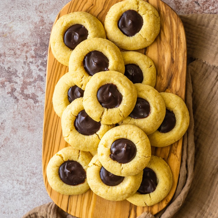 Chocolate ganache cookies on a serving board