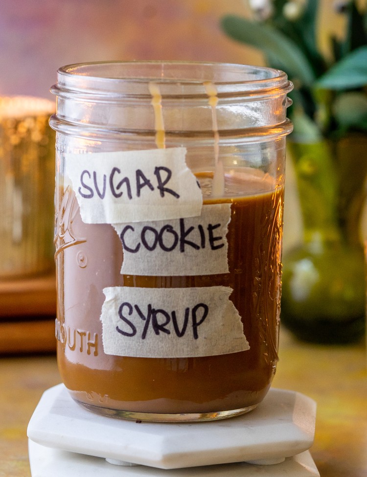 Side view of sugar cookie syrup in a glass jar