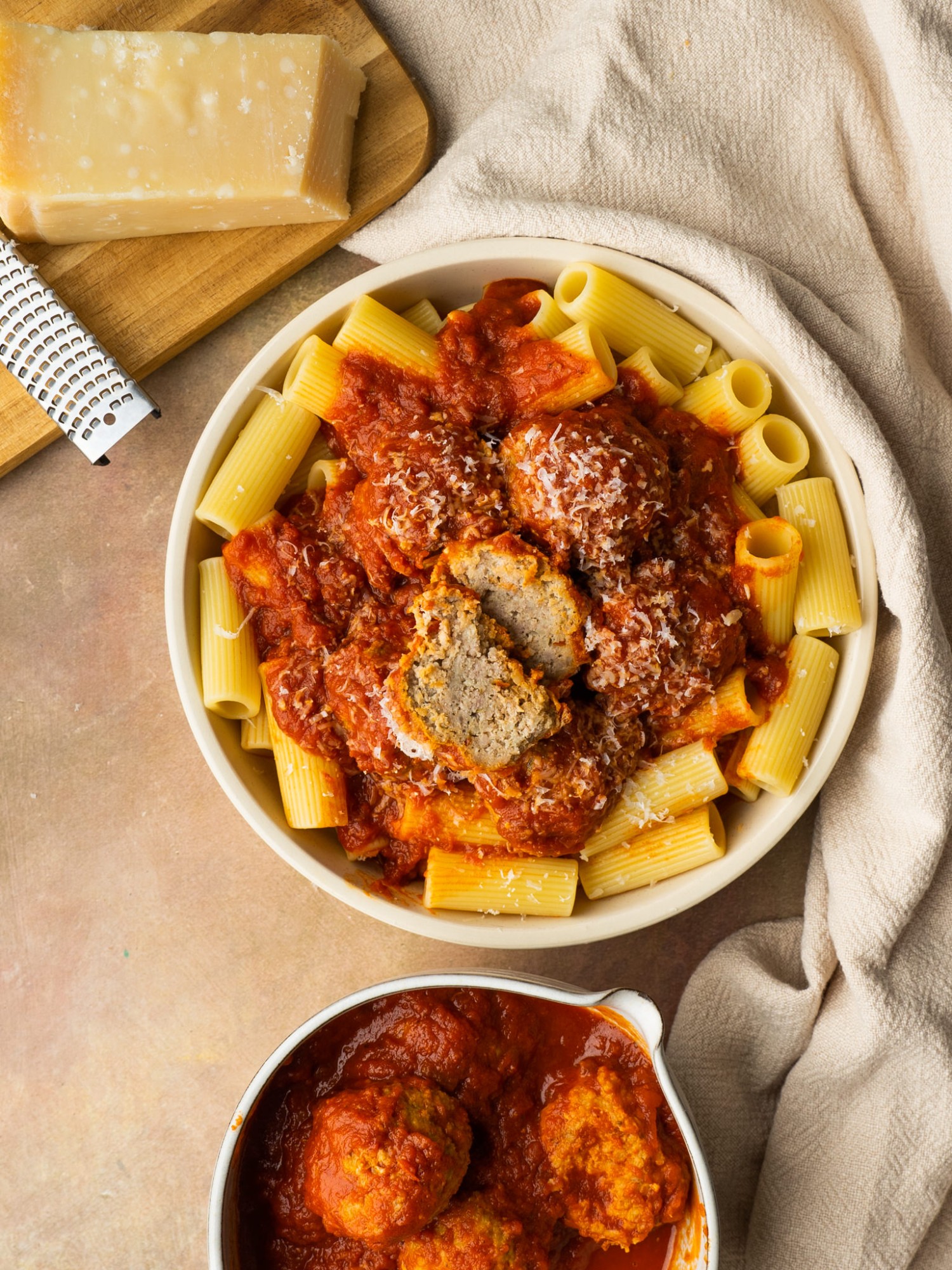 Above view of air fryer turkey meatballs served with red sauce and pasta