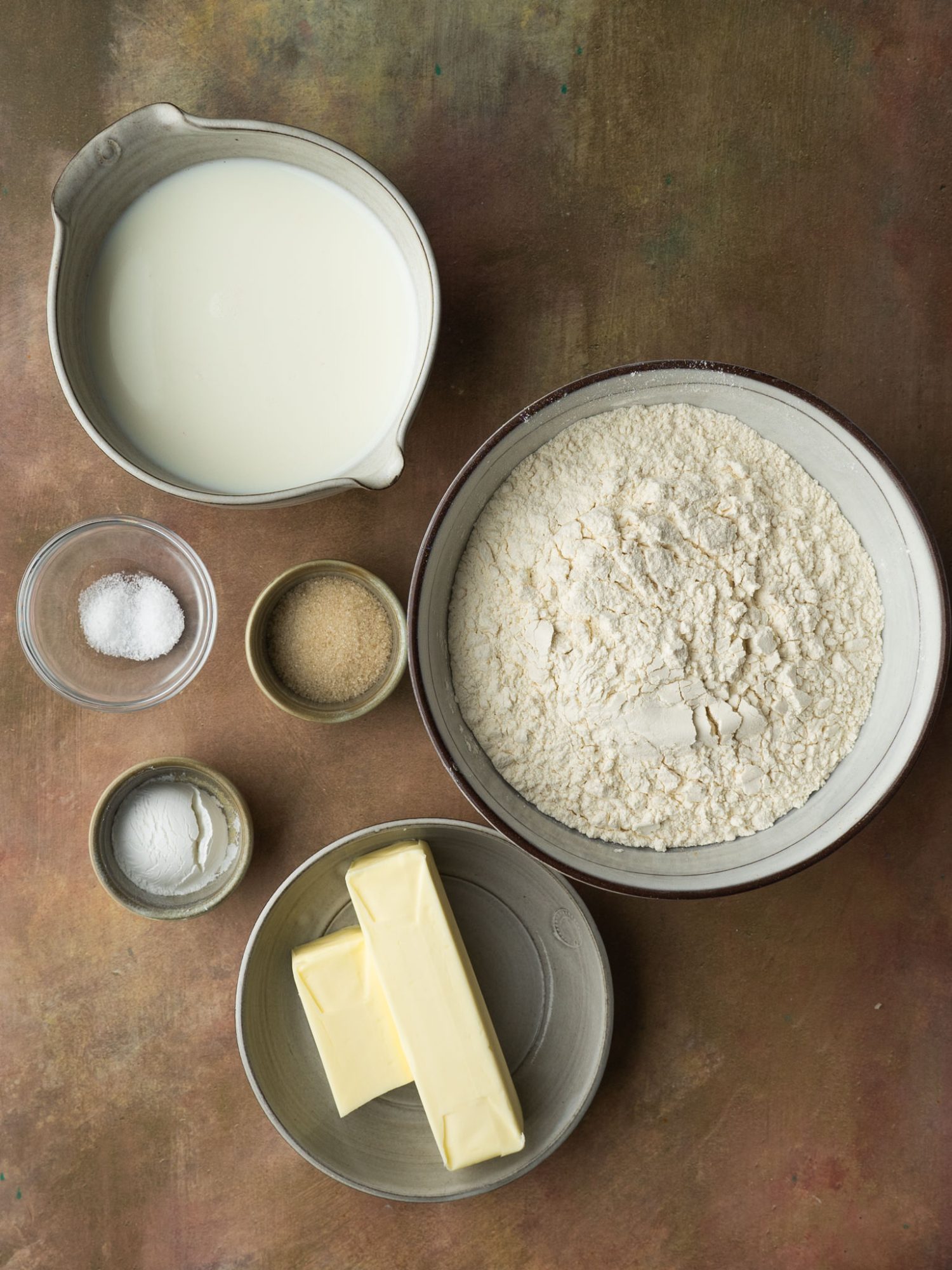 Ingredients for making butter biscuits in a cast iron skillet