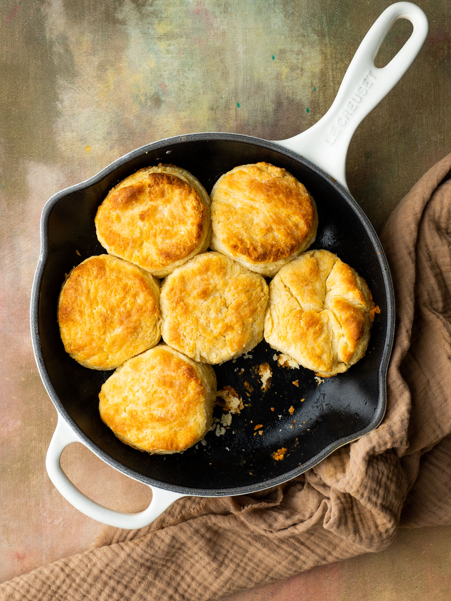 Above view of flaky biscuit recipe in a cast iron skillet