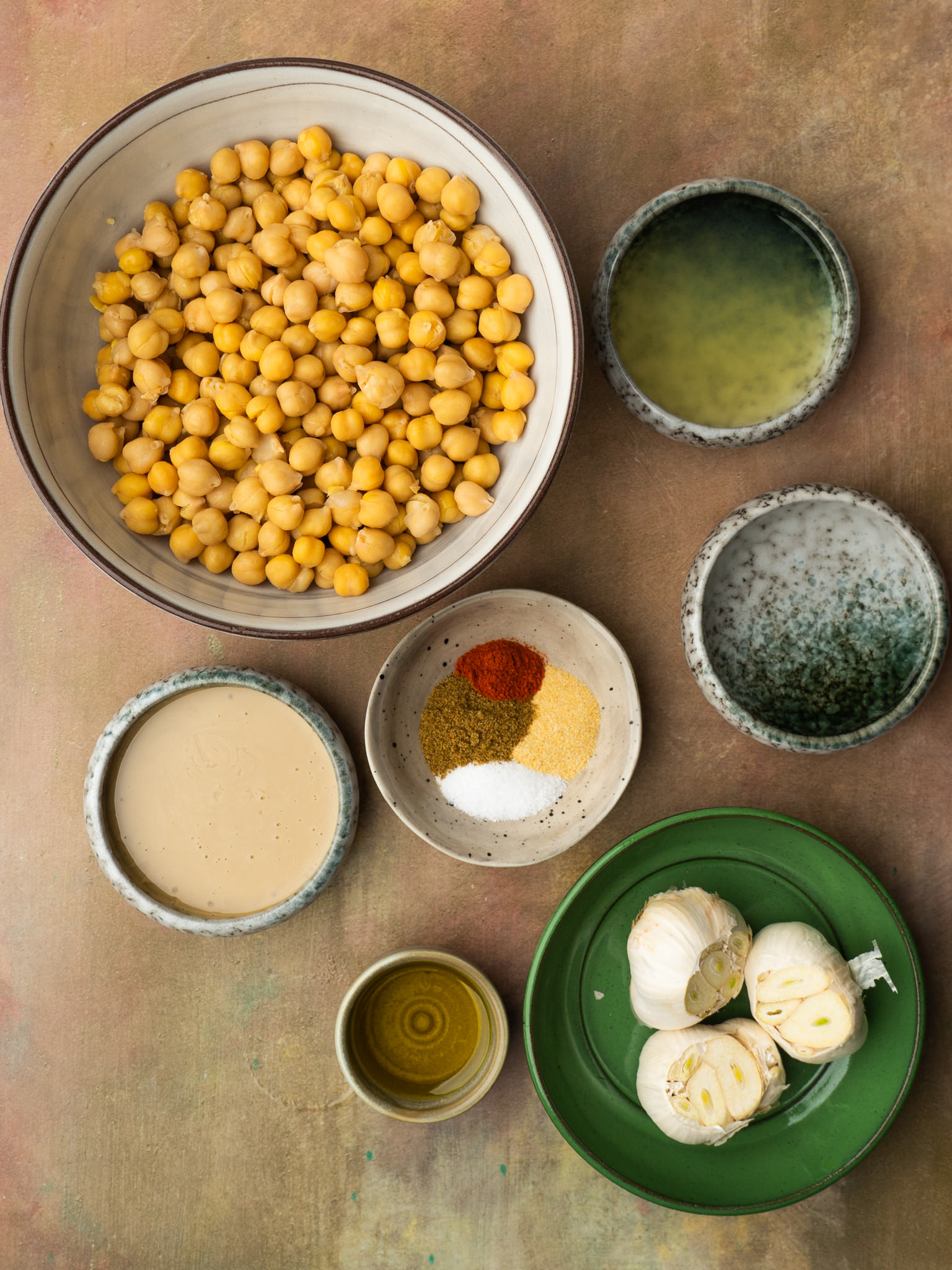 Above view of ingredients for roasted garlic hummus