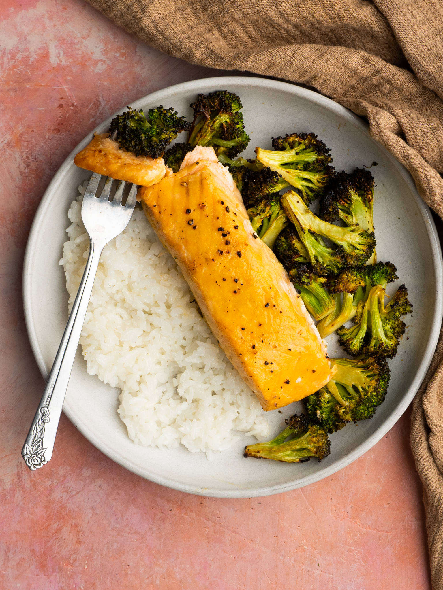 Air fryer salmon and broccoli served with white rice