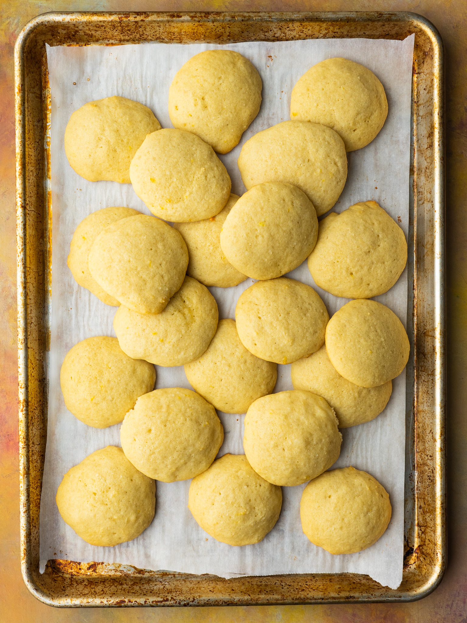 Above view of lemon ricotta cookies on a baking sheet