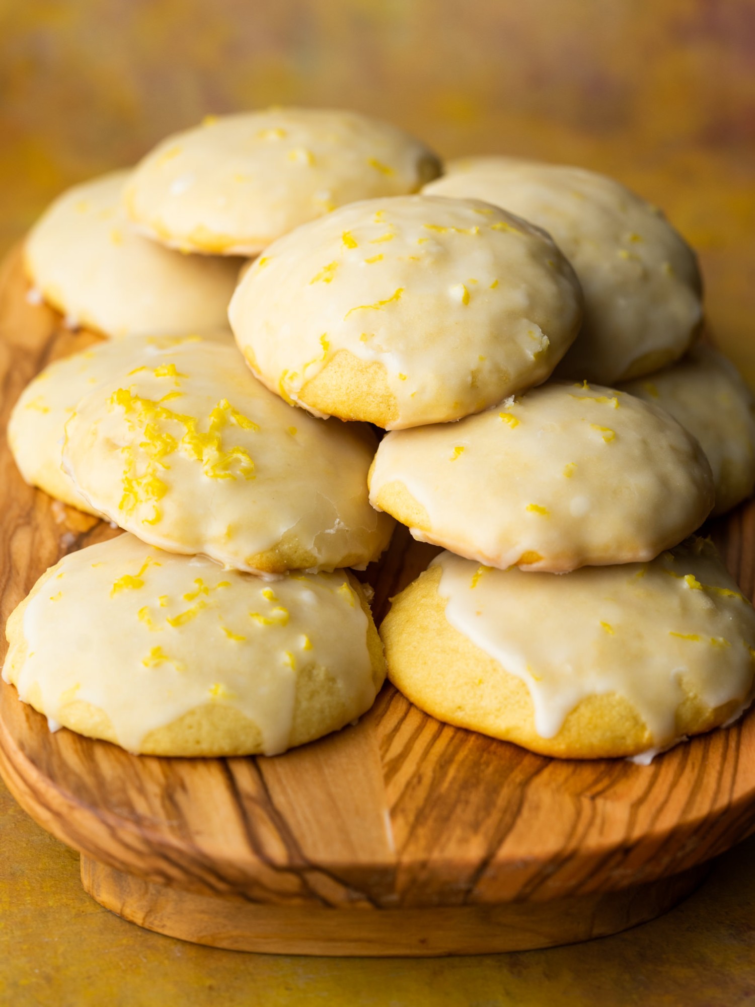 Three quarter view of the lemon ricotta cookies on a stand