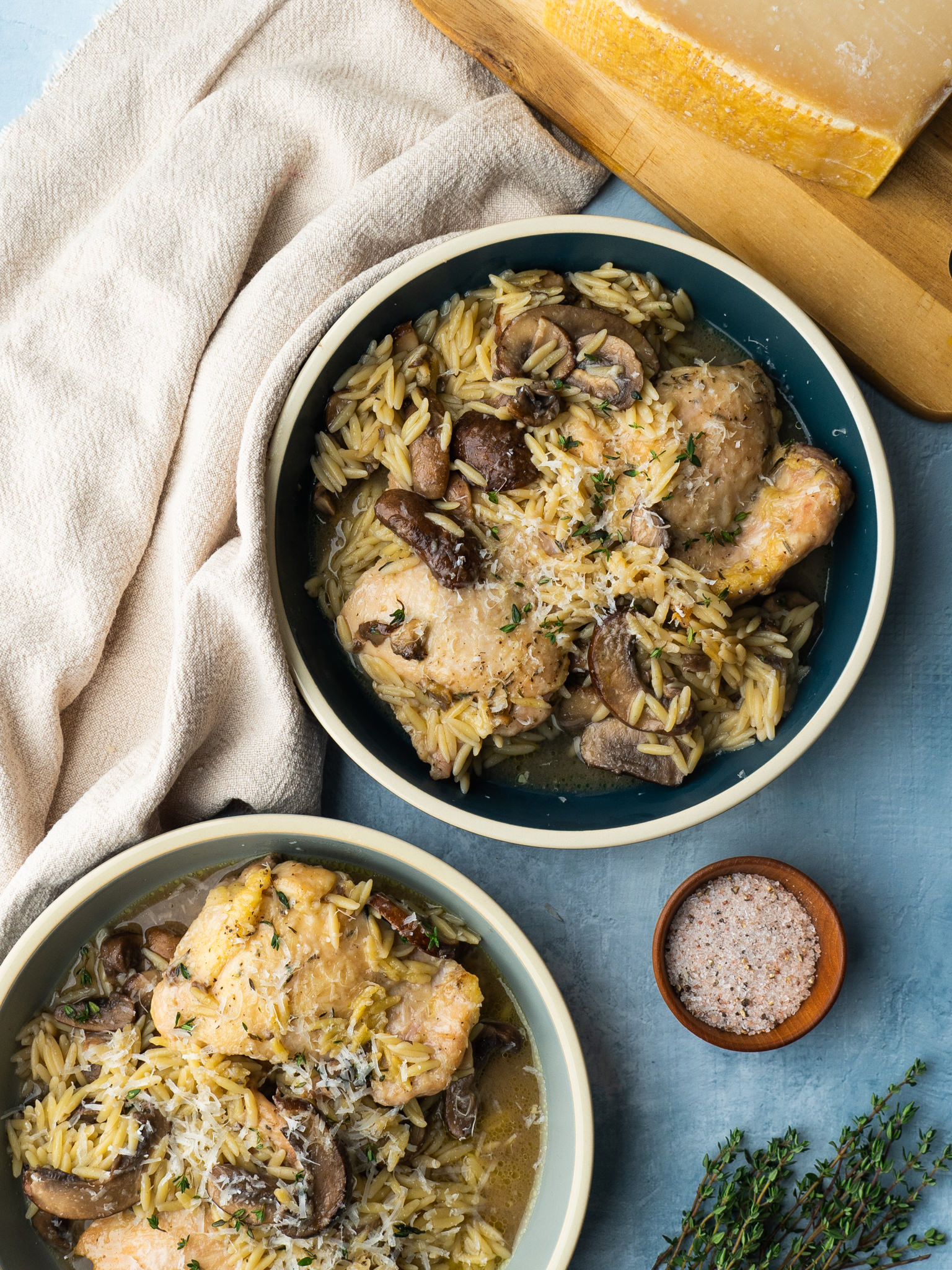 Two servings of a chicken, mushroom and orzo recipe