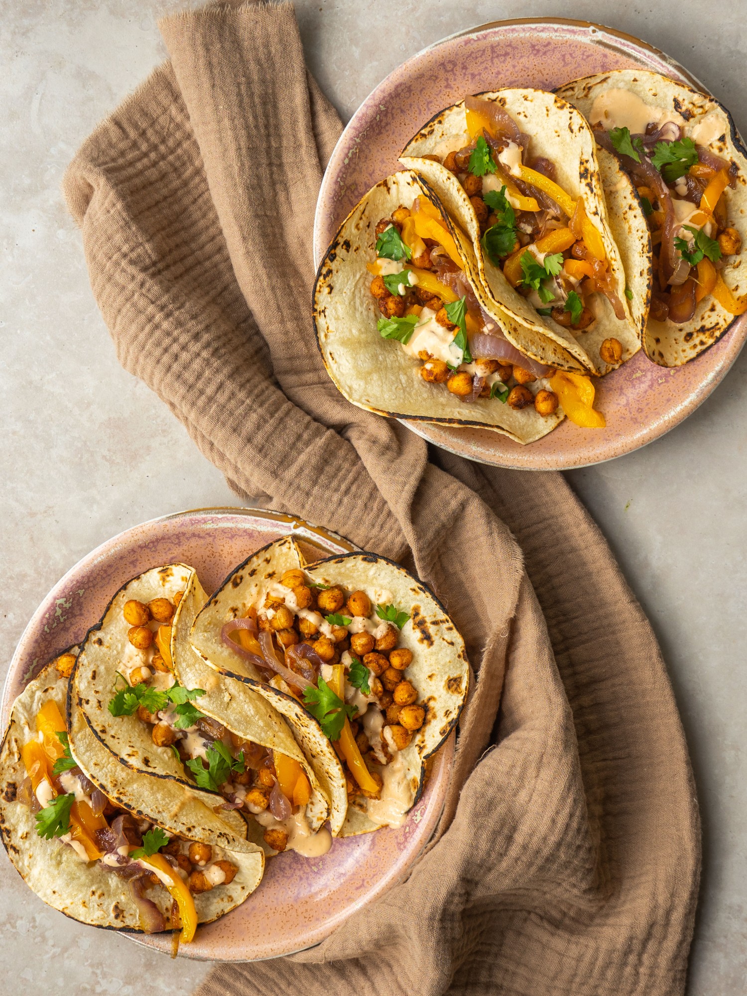 Chickpea tacos served with chipotle crema and fresh cilantro