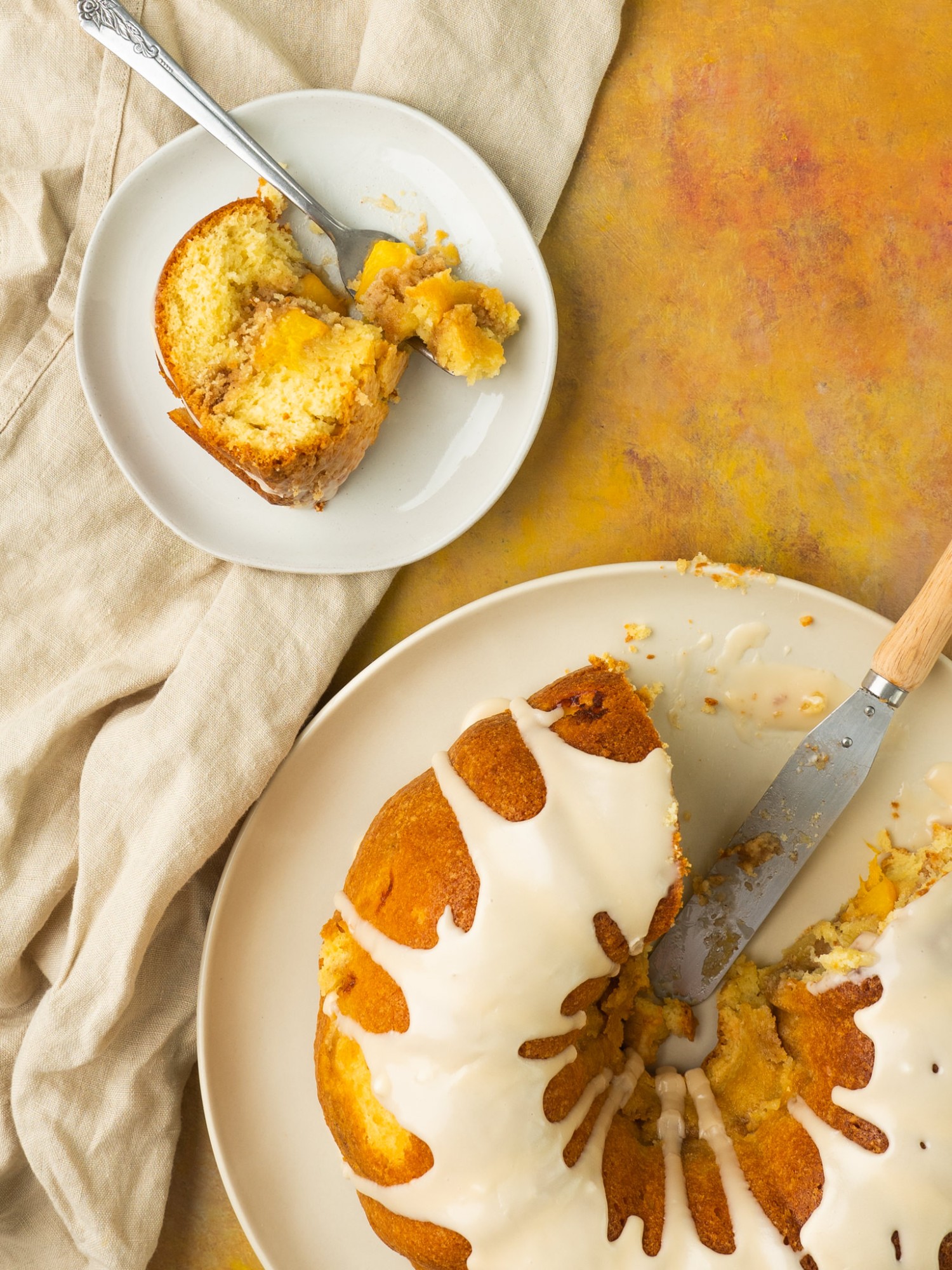 Above view of peach cobbler pound cake recipe with slices cut out