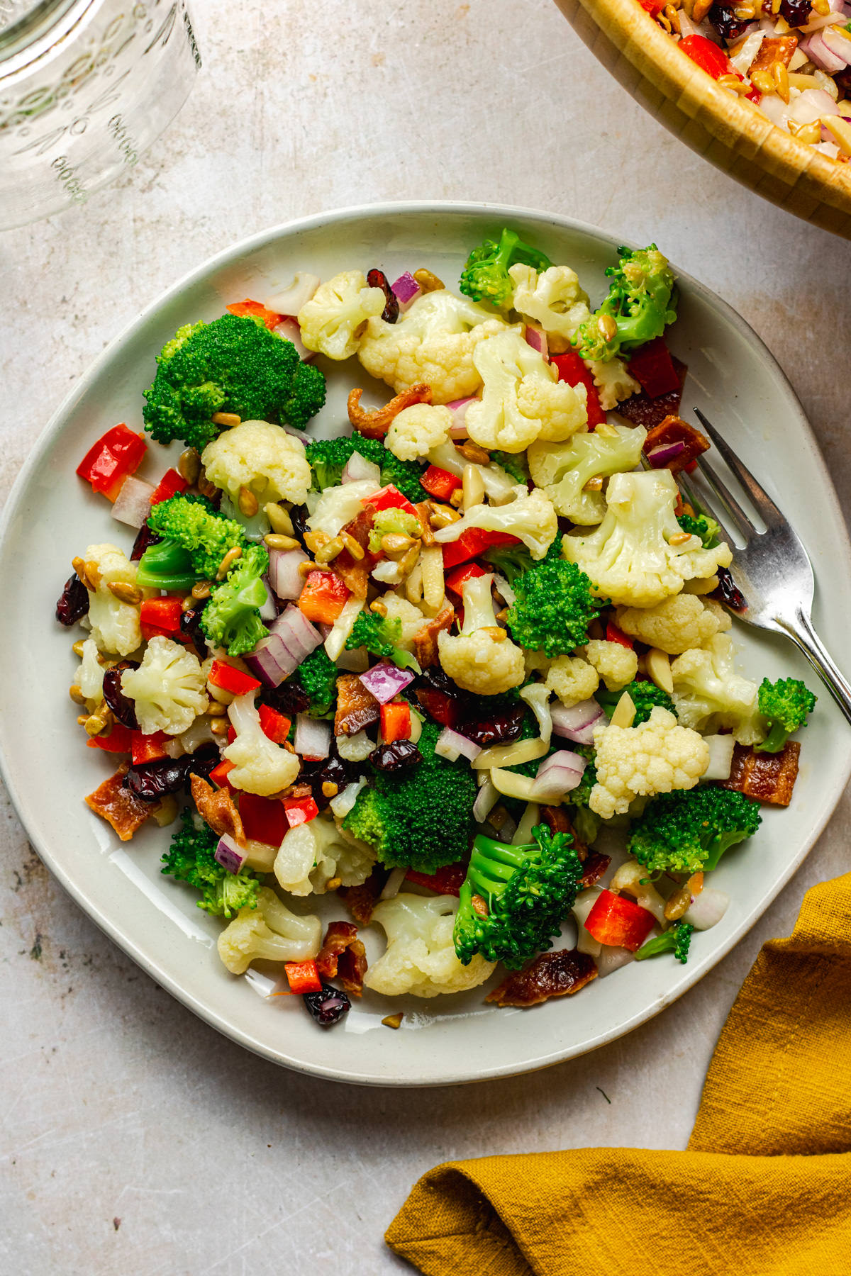 broccoli cauliflower salad on a serving plate