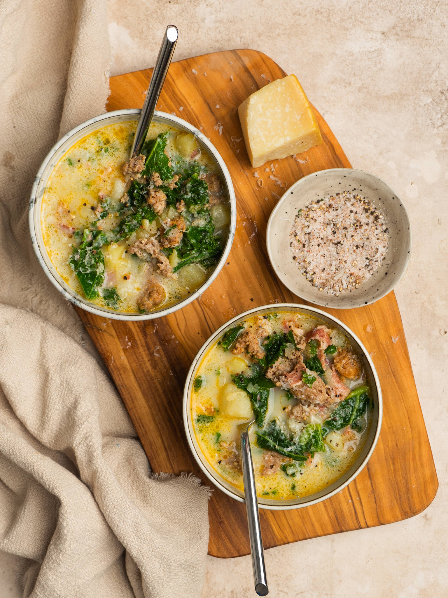 Above view of zuppa toscana recipe in serving bowls