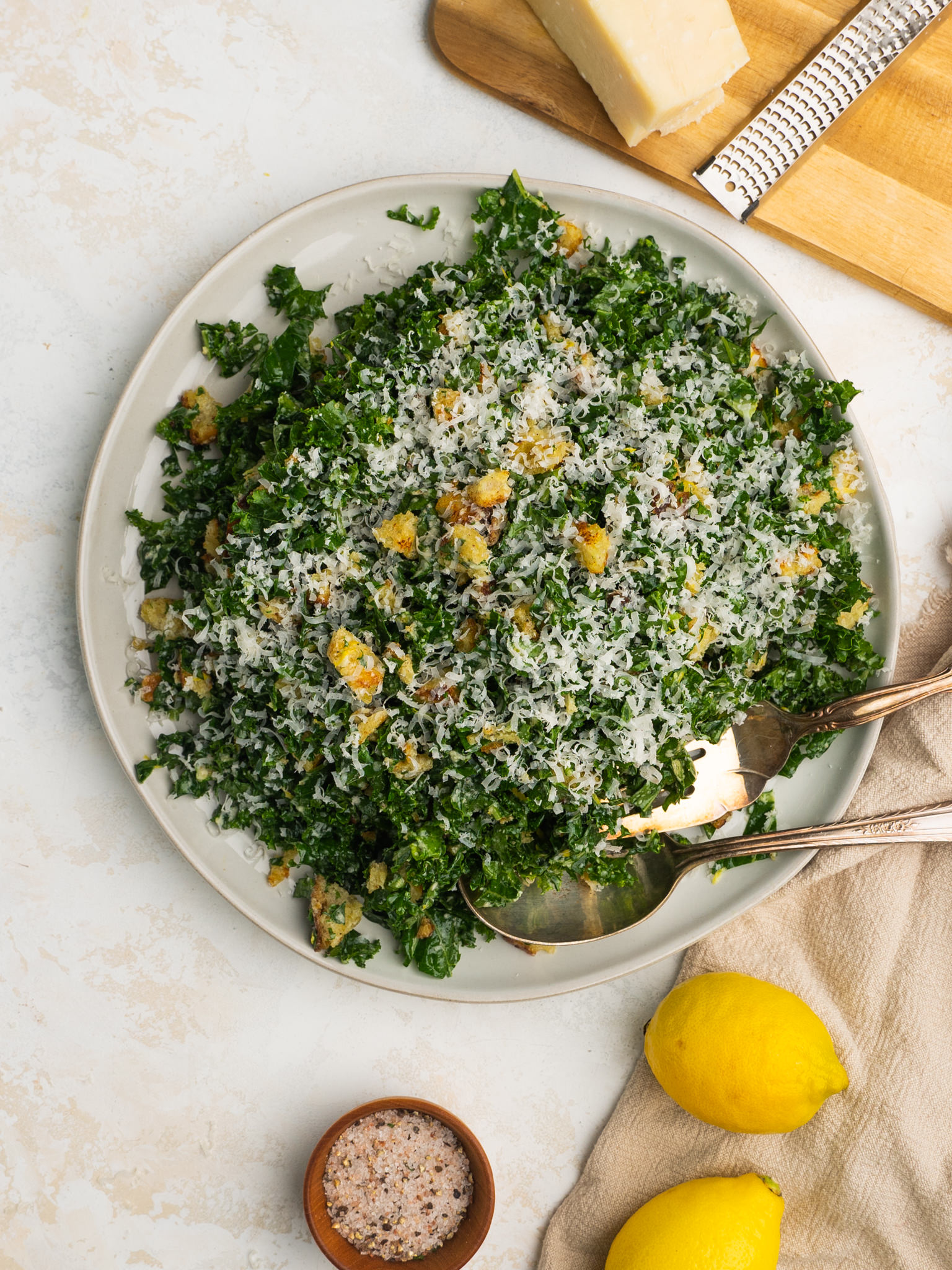 Above view of a lemon kale caesar salad recipe on a serving plate