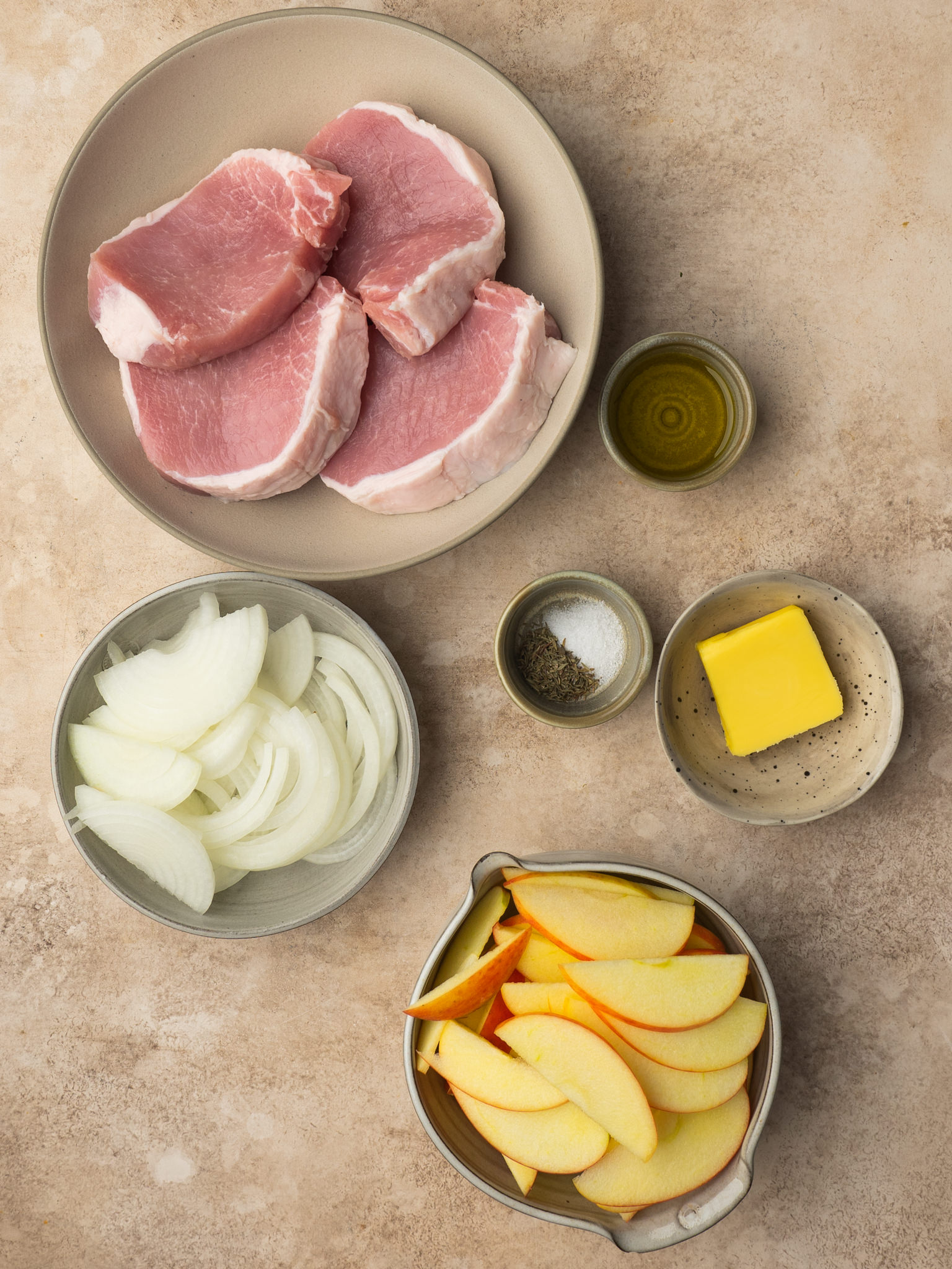 Above view of ingredients for pork chops and apples