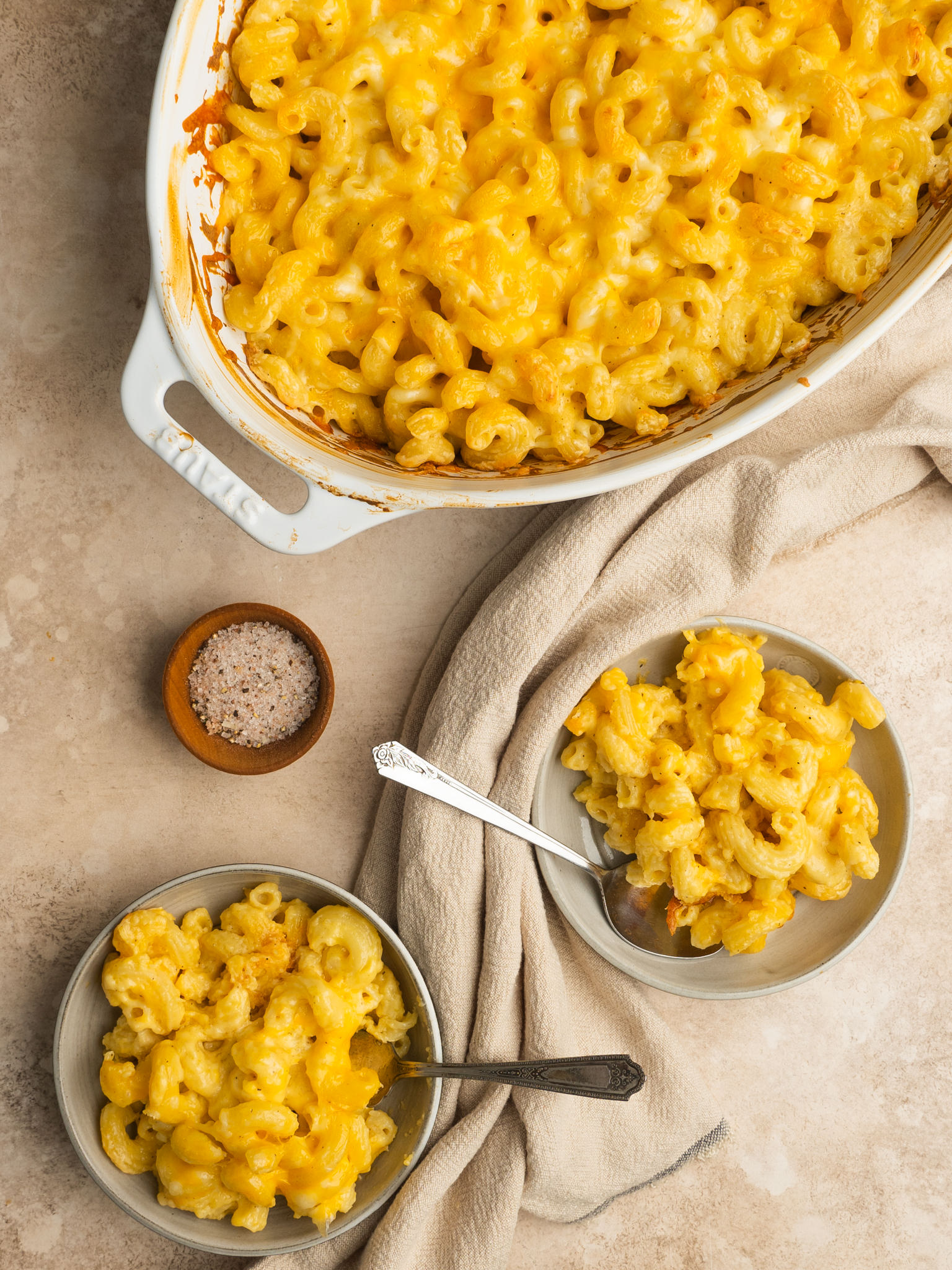 Old fashioned mac and cheese baked and served in 2 serving wolds