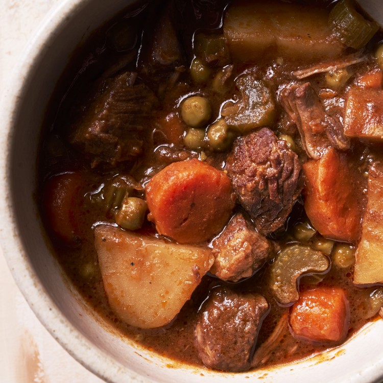 Close up above view of slow cooker beef stew in a serving bowl