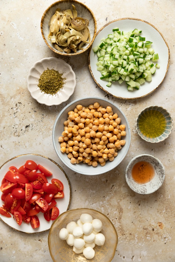 Above view of ingredients for a garbanzo bean salad