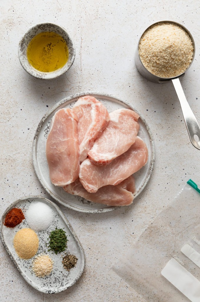 Above view of ingredients for shake n bake pork chops
