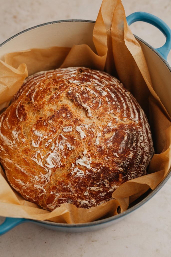 homemade loaf of bread in a dutch oven