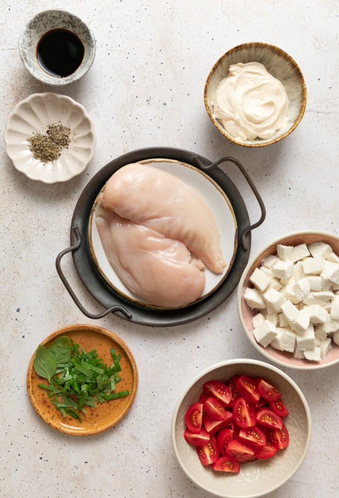 Above view of ingredients for caprese chicken salad